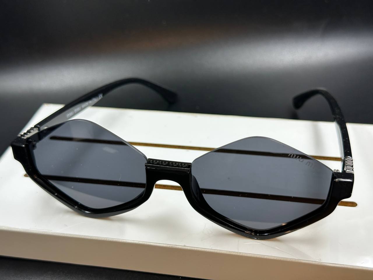 miu-miu black sunglasses