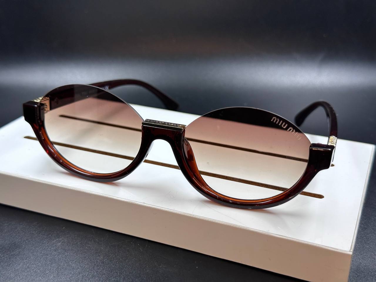 MIU-MIU brown sunglasses