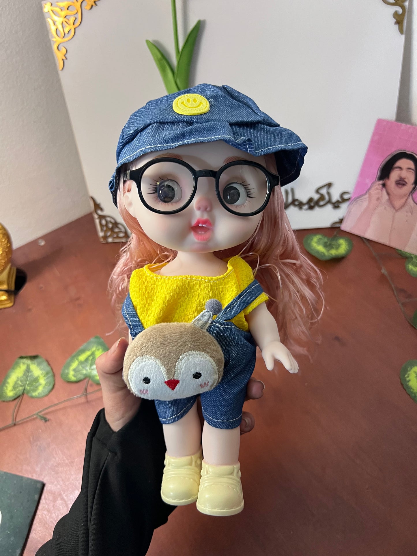 TOY WITH YELLOW OUTFIT